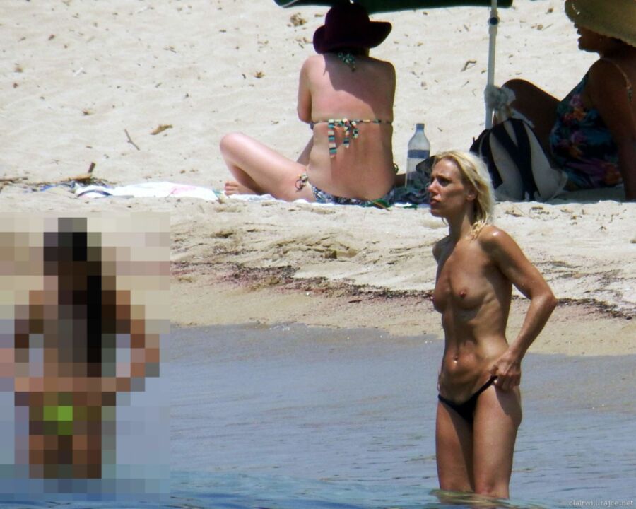 Free porn pics of Blonde MILF at the beach 1 of 50 pics