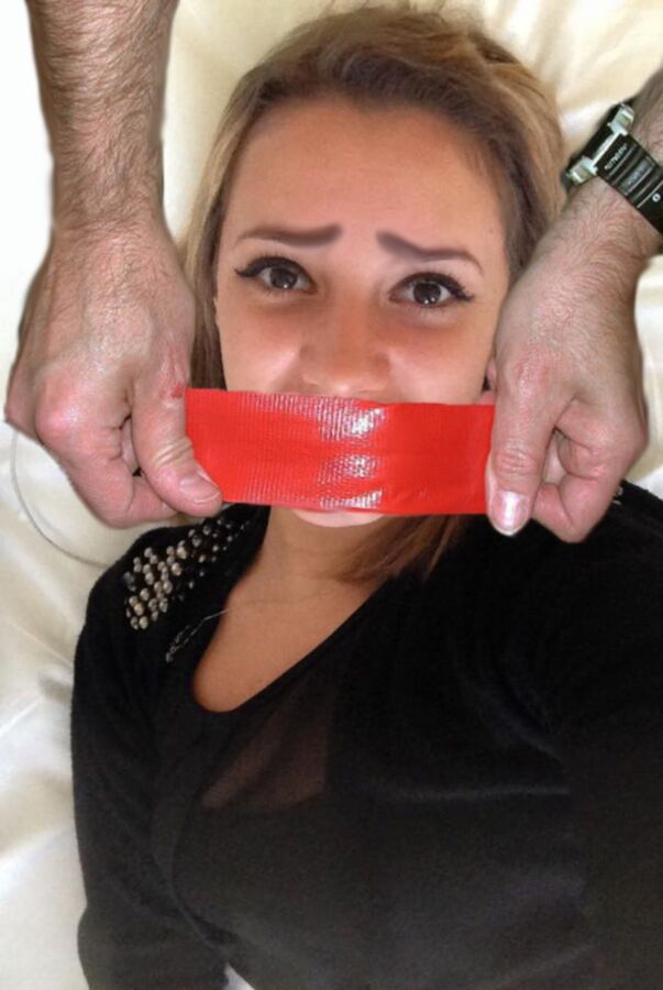 Free porn pics of Giusy bound and gagged fakes 3 of 4 pics