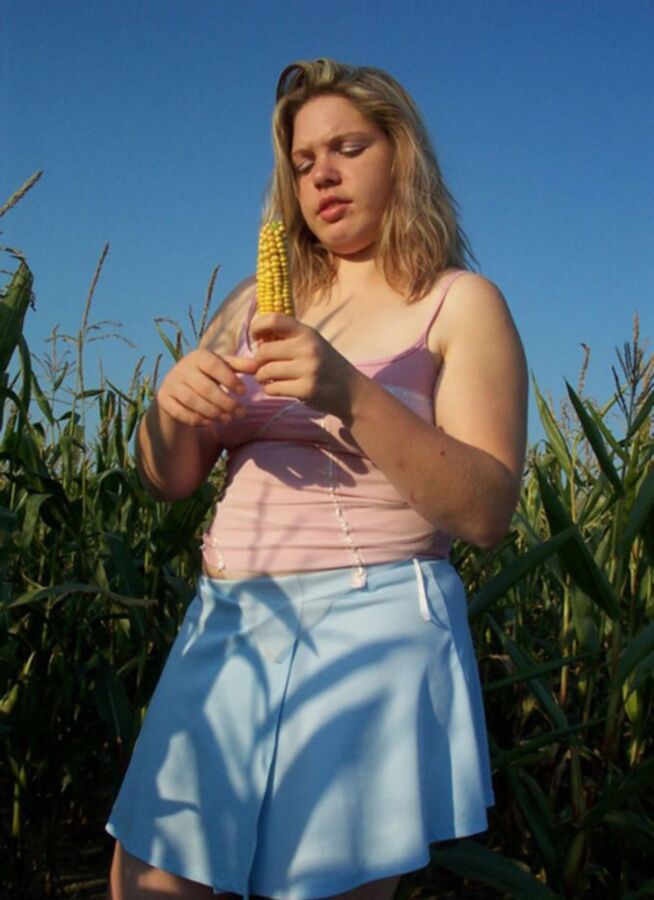 Free porn pics of Young blonde chubby stripping in corn field 2 of 16 pics