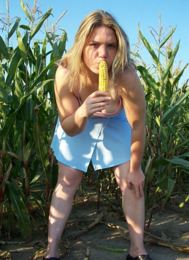 Free porn pics of Young blonde chubby stripping in corn field 3 of 16 pics