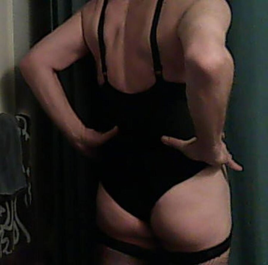Free porn pics of Crossdresser in black corset and fishnets 19 of 21 pics