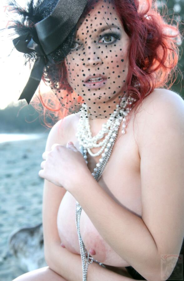 Free porn pics of Naturally Busty Tessa in face veil and corset on Beach 17 of 101 pics