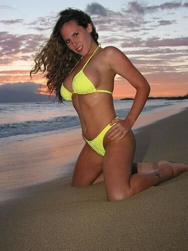 Free porn pics of Jill Cannon in a yellow bikini 3 of 11 pics