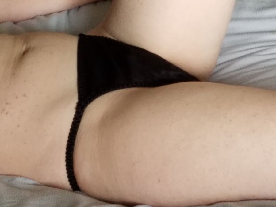 Free porn pics of Wife posing in black satin panties 3 of 5 pics