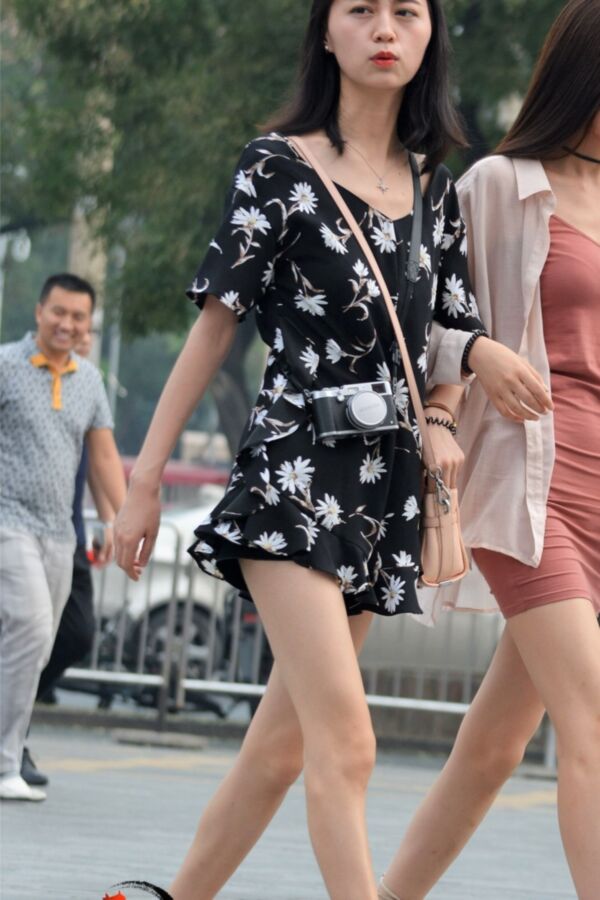 Free porn pics of Street Voyeur: Sexy Chinese girls in short skirts. 8 of 40 pics