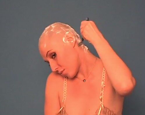 Free porn pics of Lori shaves her head bald 8 of 10 pics