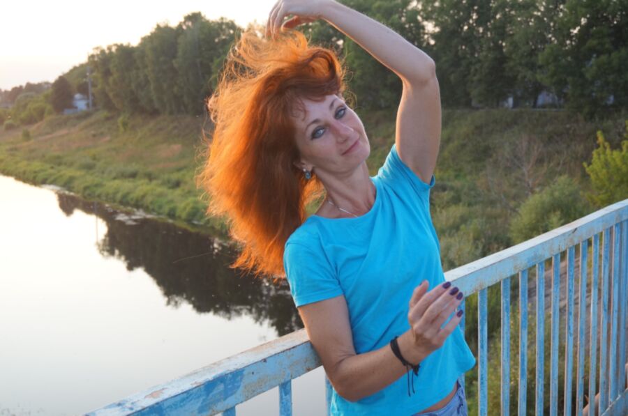 Free porn pics of Flamehair in evening on the bridge 1 of 12 pics
