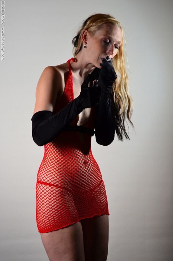 Free porn pics of skinny blond smoking in red fishnets 3 of 104 pics