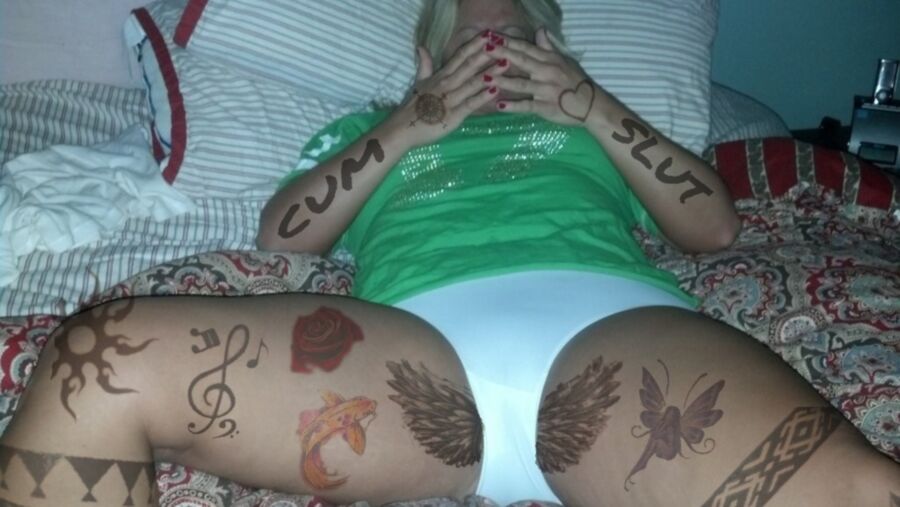 Free porn pics of Cum sluts fake tattoos 6 of 10 pics