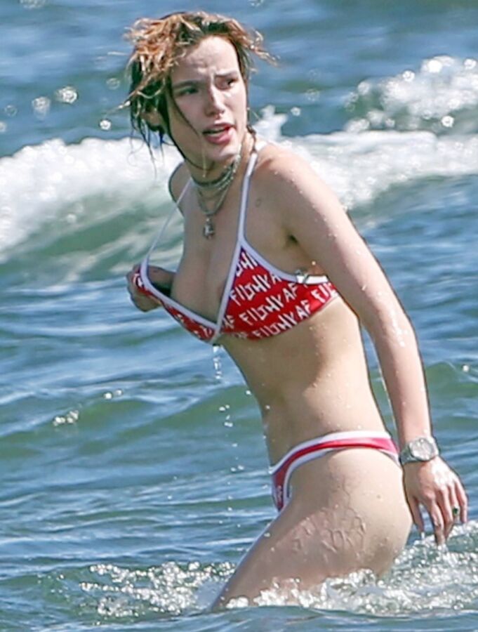 Free porn pics of Bella Thorne Nip Slip Bikini 3 of 8 pics