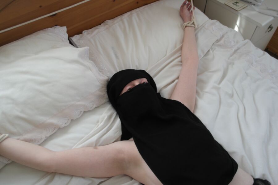 Free porn pics of Muslim wife in Niqab suspenders bondage Submission 14 of 42 pics