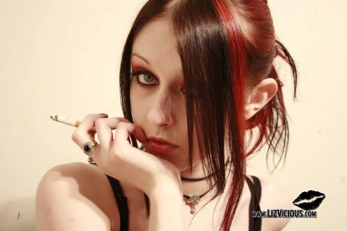 Free porn pics of LIZ VICIOUS SMOKING, SMALL, NICE, GOTH AND HOT! 1 of 43 pics