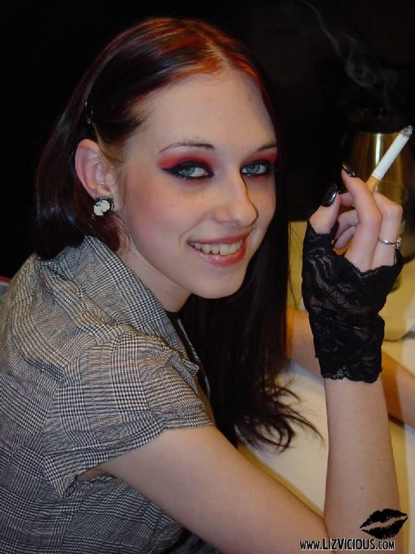 Free porn pics of LIZ VICIOUS SMOKING, SMALL, NICE, GOTH AND HOT! 21 of 43 pics