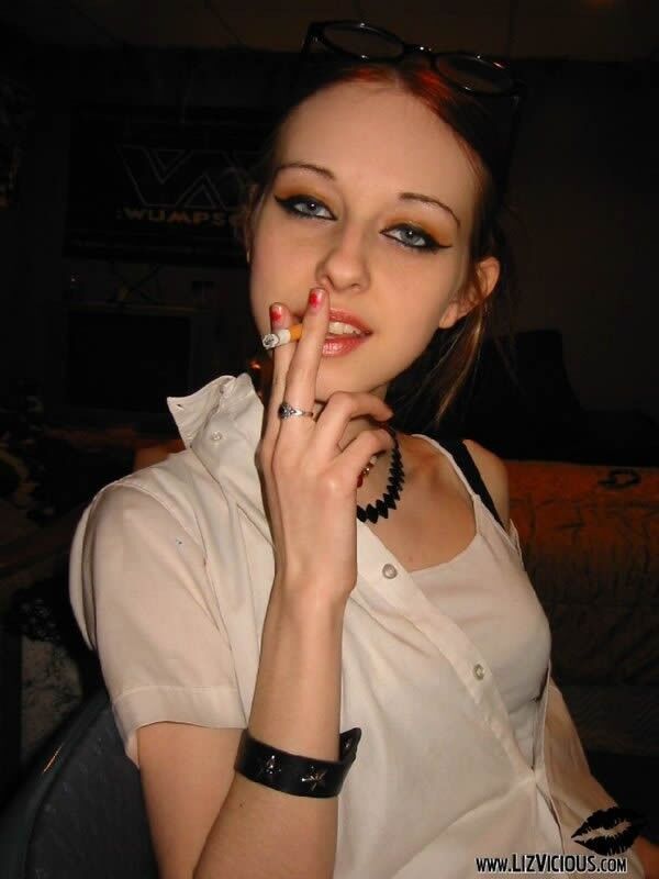 Free porn pics of LIZ VICIOUS SMOKING, SMALL, NICE, GOTH AND HOT! 3 of 43 pics