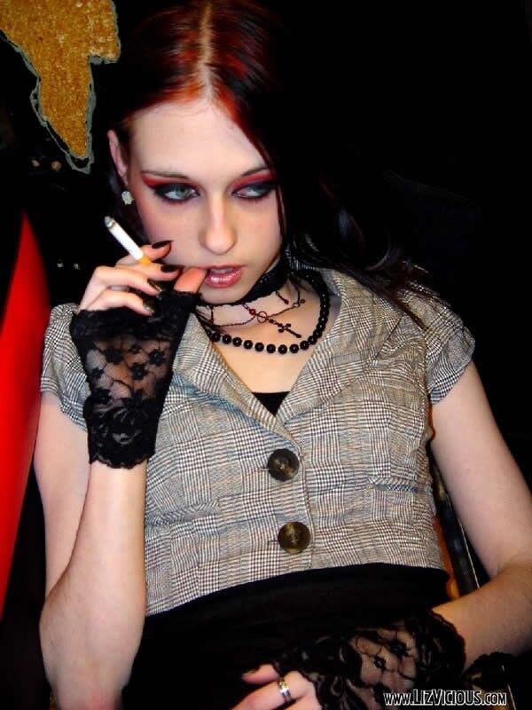 Free porn pics of LIZ VICIOUS SMOKING, SMALL, NICE, GOTH AND HOT! 24 of 43 pics