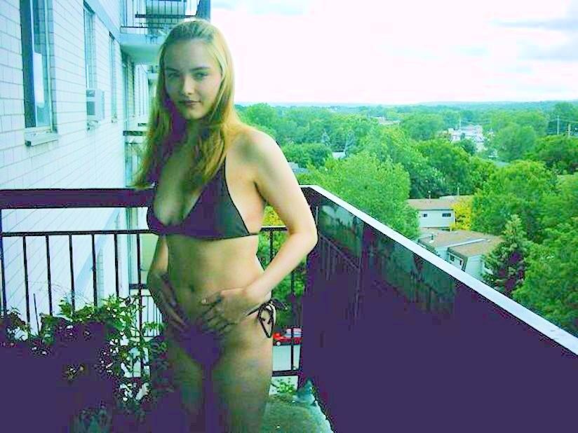 Free porn pics of Stacy Works Black String Bikini Ass Balcony 3 of 15 pics