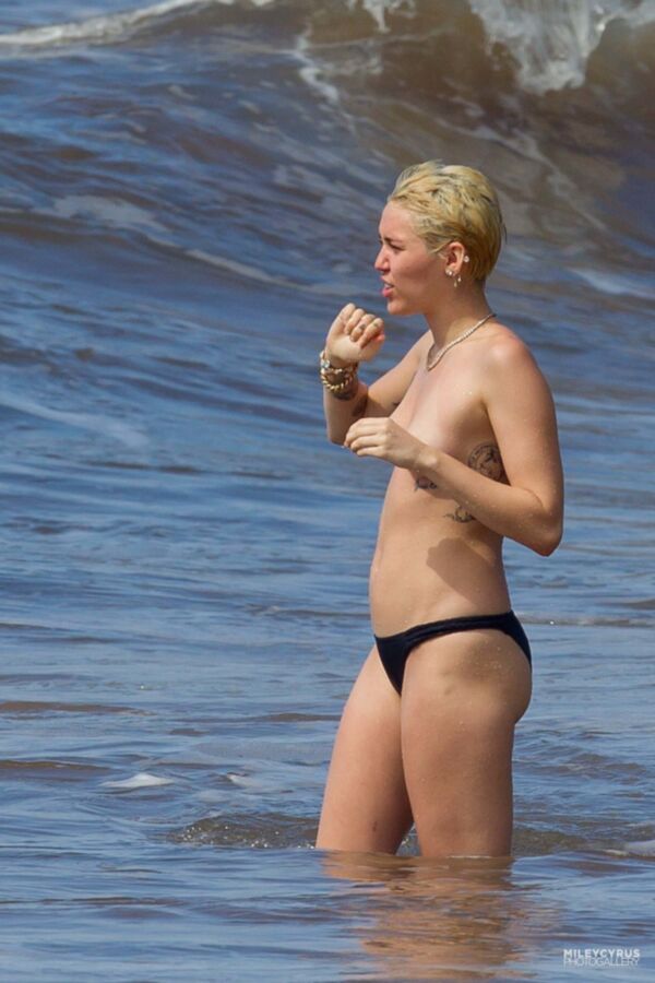 Free porn pics of Short-haired Miley Cyrus topless 22 of 38 pics