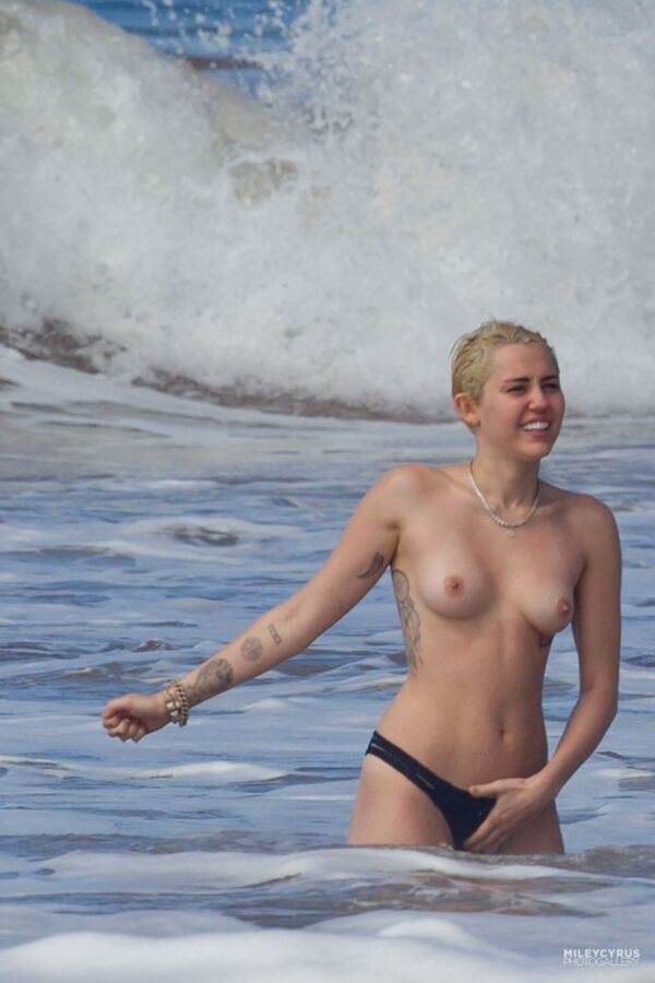 Free porn pics of Short-haired Miley Cyrus topless 14 of 38 pics