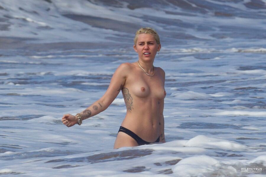 Free porn pics of Short-haired Miley Cyrus topless 11 of 38 pics