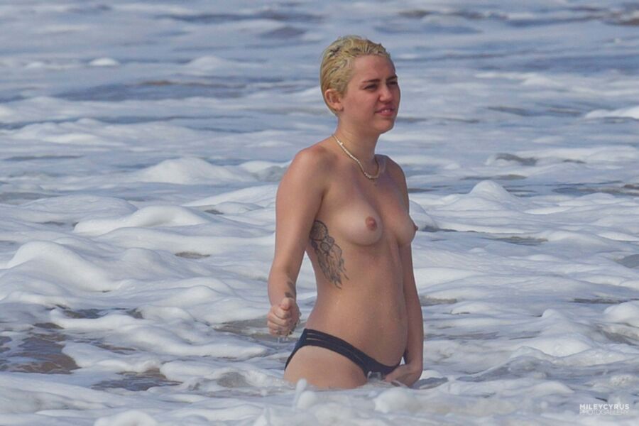 Free porn pics of Short-haired Miley Cyrus topless 10 of 38 pics