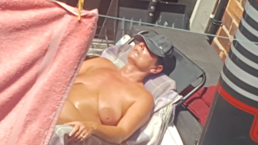 Free porn pics of Candid - Neighbour Sunbathing 1 of 6 pics