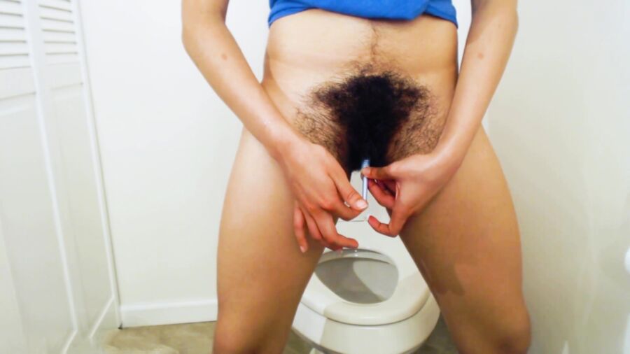 Free porn pics of Kinky Curly Keona very hairy bush pussy change her tampon 22 of 29 pics