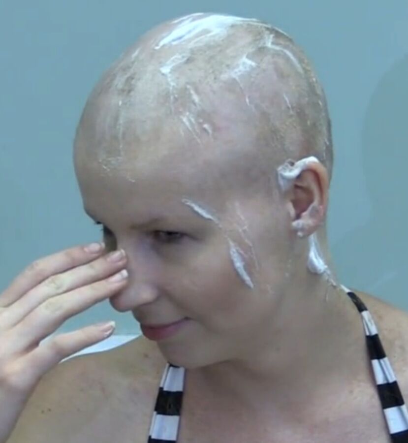 Free porn pics of Beautiful blonde shaved bald 5 of 6 pics