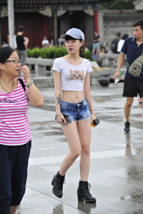 Free porn pics of On the street: Chinese girls in shorts. 21 of 40 pics
