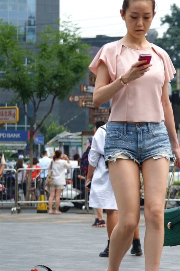 Free porn pics of On the street: Chinese girls in shorts. 9 of 40 pics