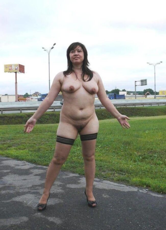 Free porn pics of Naked slut behind the wheel. 19 of 21 pics