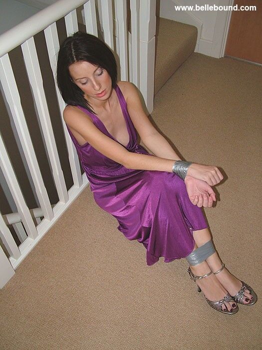 Free porn pics of Chrissy - Tape bound in evening dress and strappy heels 3 of 40 pics