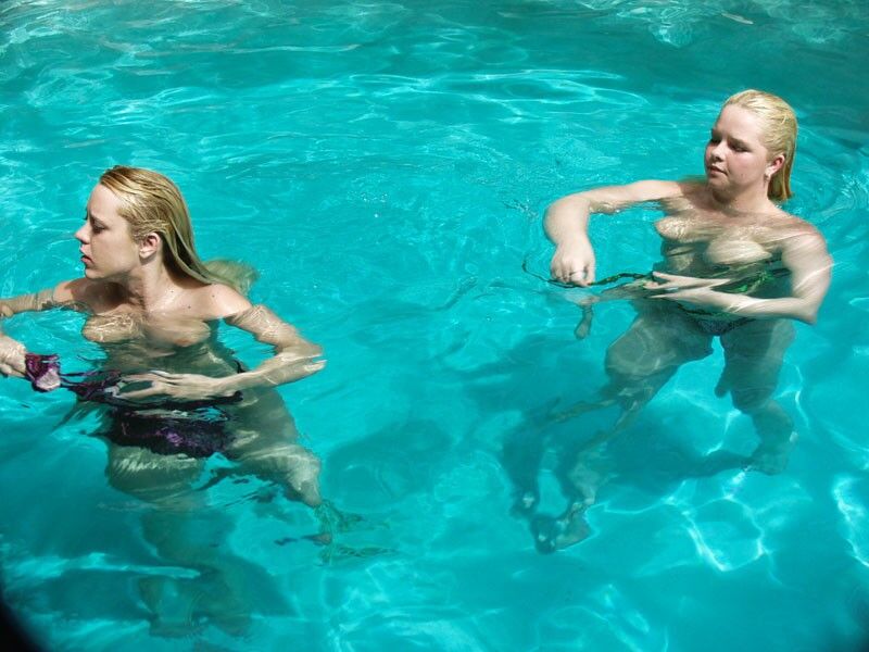 Free porn pics of Jessica having fun with her friend in the pool 15 of 36 pics