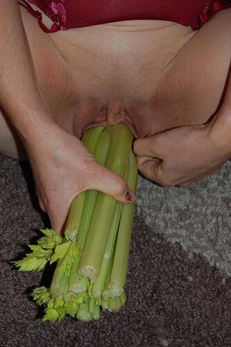 Free porn pics of Julie Hall a carrot and a bunch of celery 8 of 10 pics