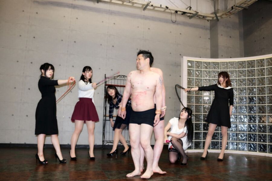 Free porn pics of Japanese dominatrices whip their male slaves 9 of 43 pics