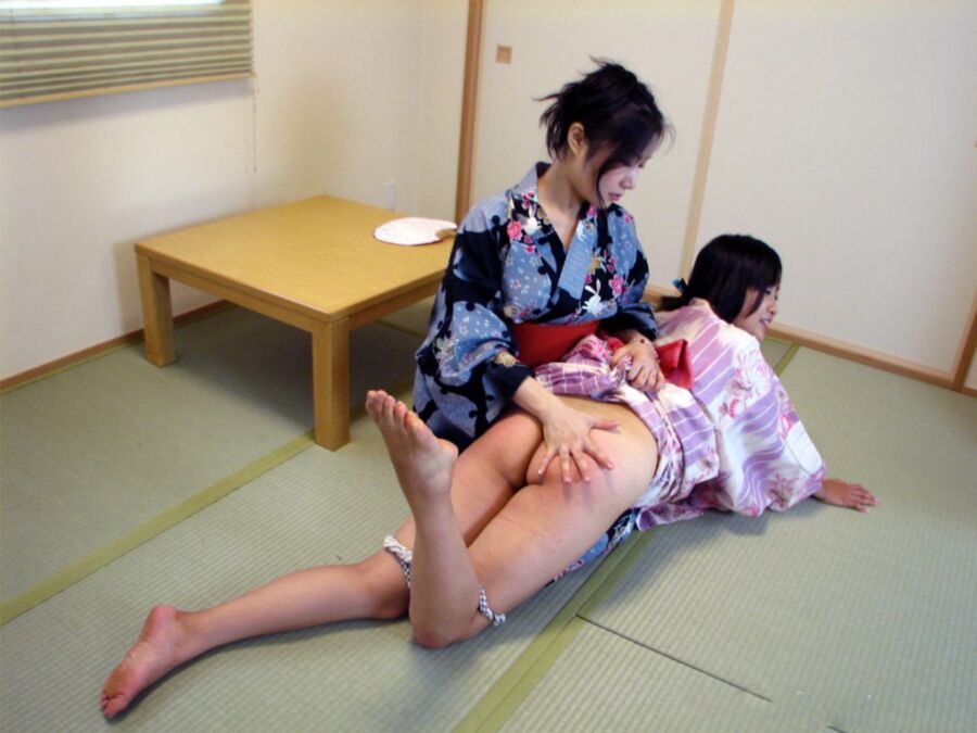 Free porn pics of Japanese femdom lesbian spankings 14 of 83 pics