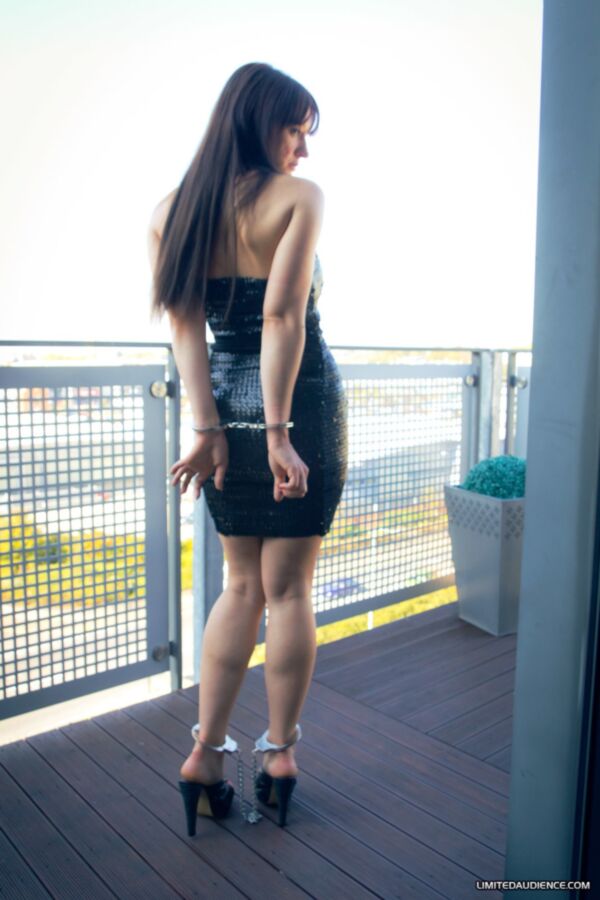 Free porn pics of Becky - Manacled on the balcony in strapless dress and mules 1 of 39 pics