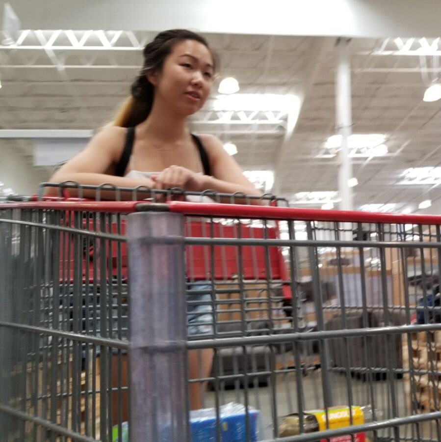 Free porn pics of cheeky asian shopping around wearing short jean shorts 1 of 36 pics