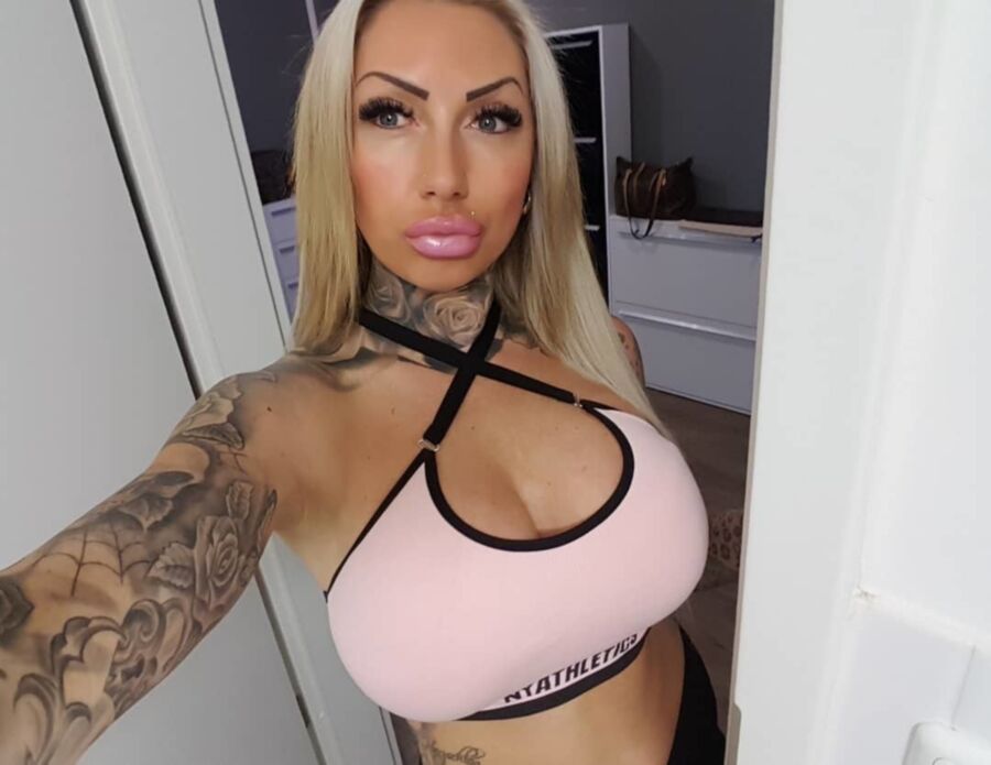 Free porn pics of Tattooed German Bimbo With Fake Lips 3 of 52 pics