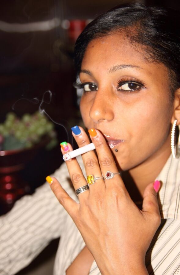 Free porn pics of Well-endowed Ebony Lil Chica smokes a fag 6 of 66 pics