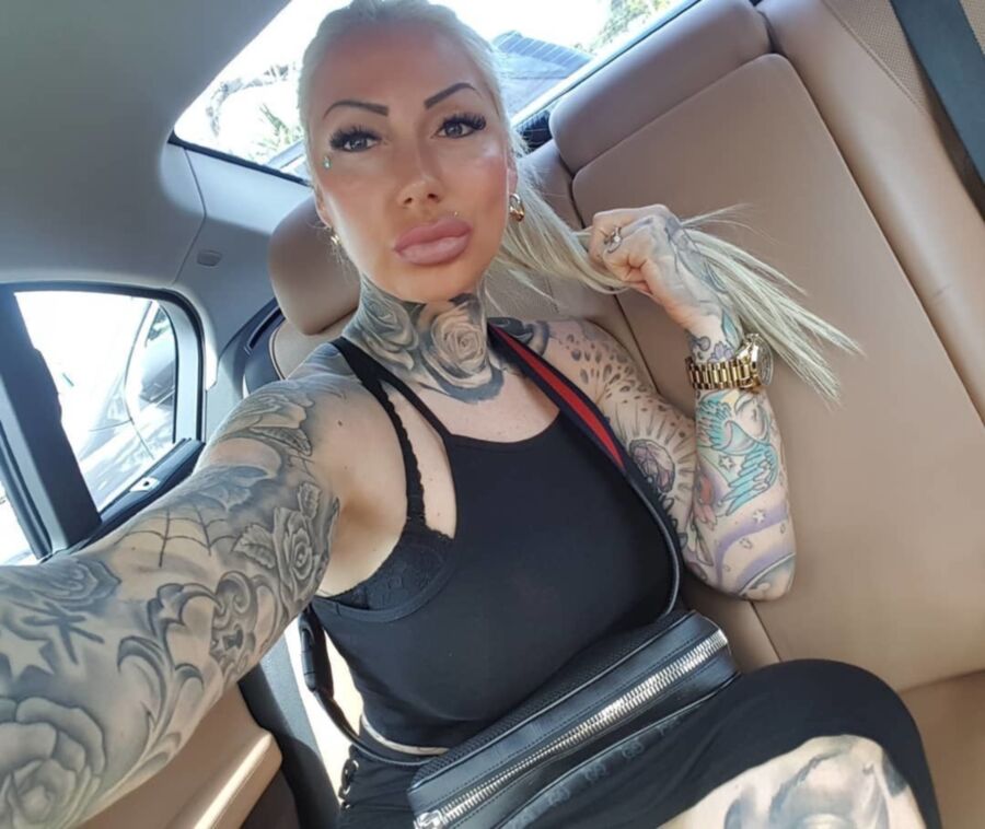 Free porn pics of Tattooed German Bimbo With Fake Lips 23 of 52 pics