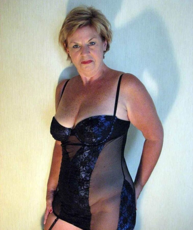Free porn pics of Who is this GILF 4 of 8 pics