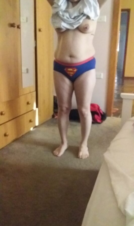 Free porn pics of Wife in Super Man Panties Getting changed Unaware 20 of 24 pics