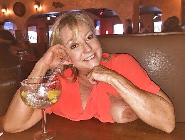 Free porn pics of Mature US MILF loves flashing great boobs in public 5 of 15 pics