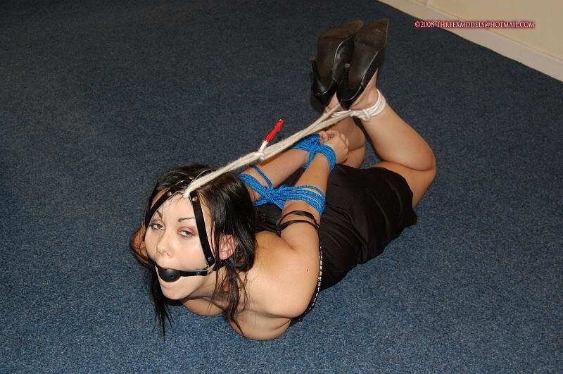 Free porn pics of Danielle - Hogtied in an LBD and pumps during the office party 21 of 30 pics