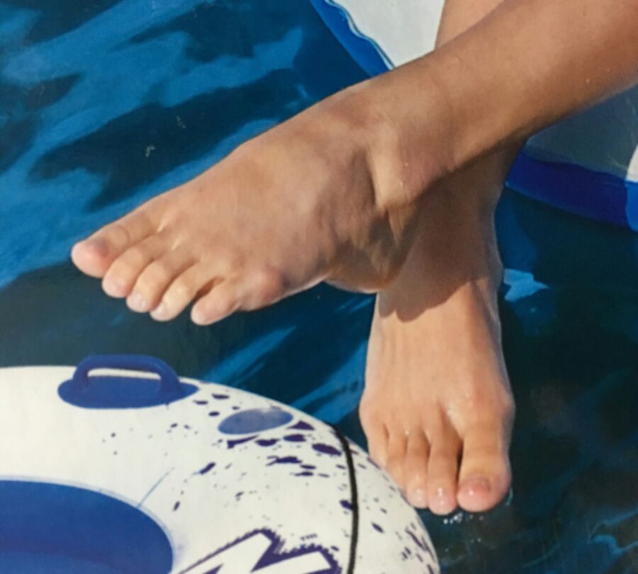 Free porn pics of Girl with sexy feet on an inflatable raft box.  4 of 4 pics