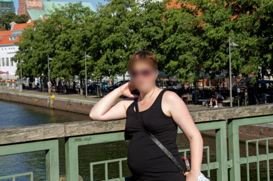 Free porn pics of My preggo slave on vacation with black dressed outdoor and no... 1 of 6 pics