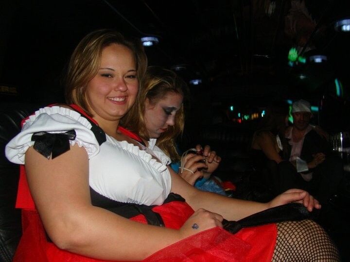 Free porn pics of Cute curvy brunette shows cleavage on Halloween 6 of 8 pics
