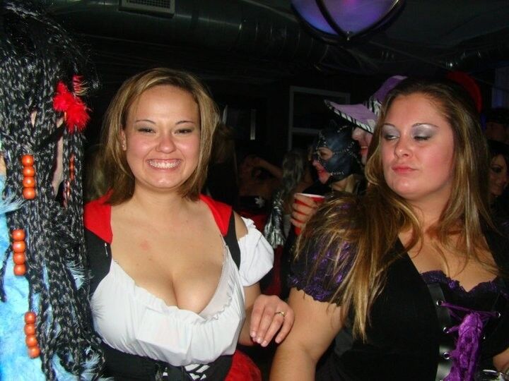 Free porn pics of Cute curvy brunette shows cleavage on Halloween 1 of 8 pics