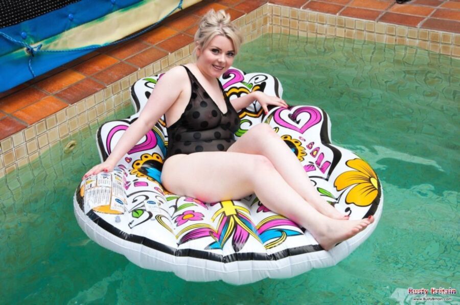 Free porn pics of Danni Marie floats around in the pool 2 of 12 pics
