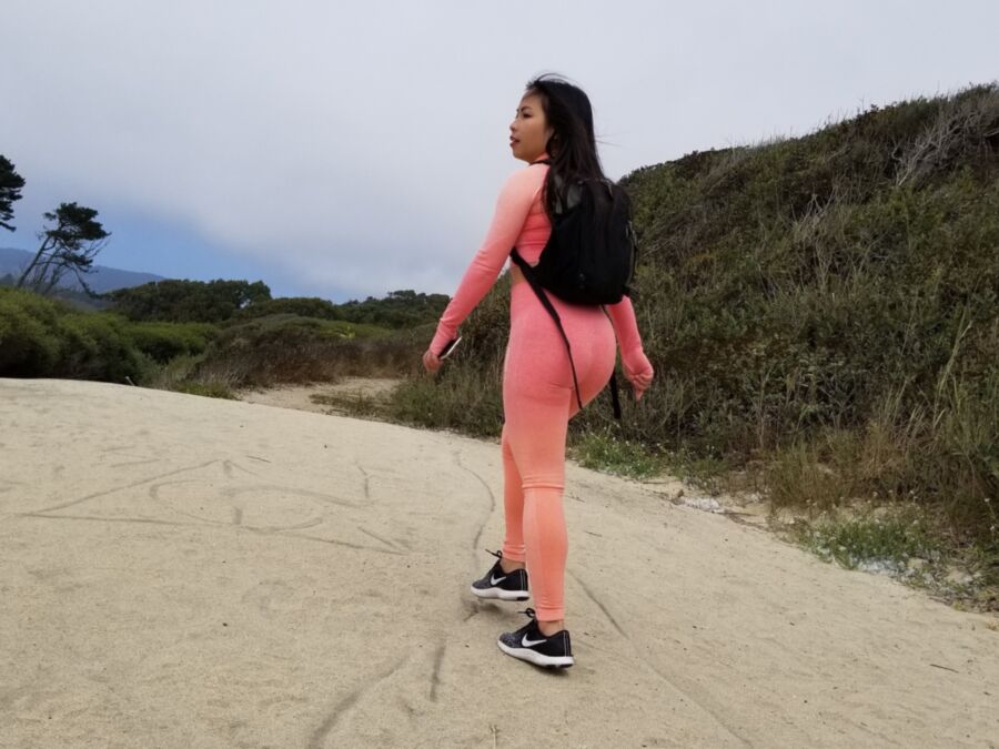 Free porn pics of Hot Asian walking around in tight pink yoga pants at the Beach p 11 of 14 pics
